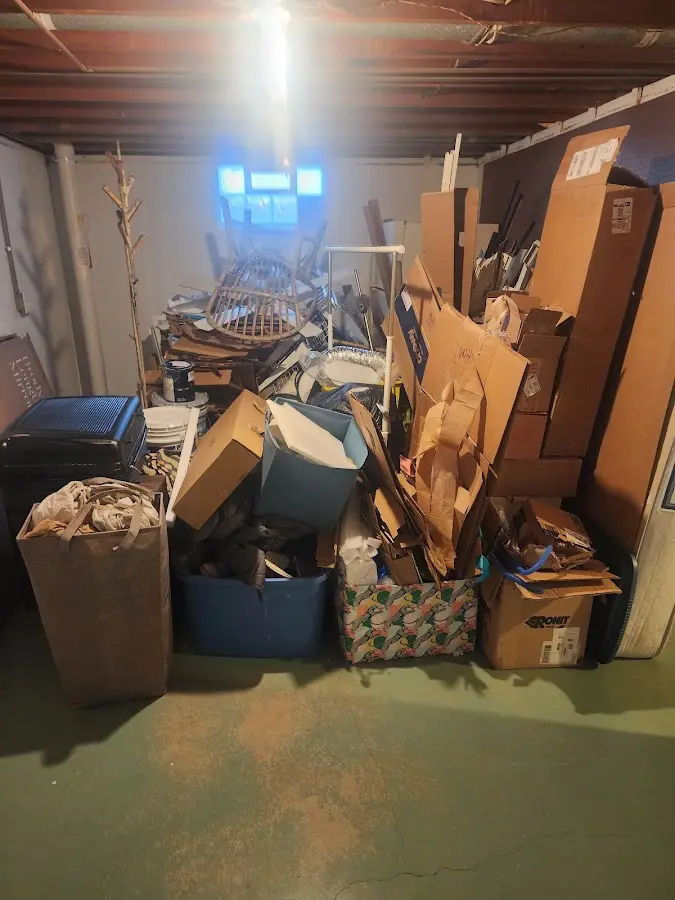 Roll-off dumpster container at job site for 2 Yard Dumpster Rental in Steiner Ranch